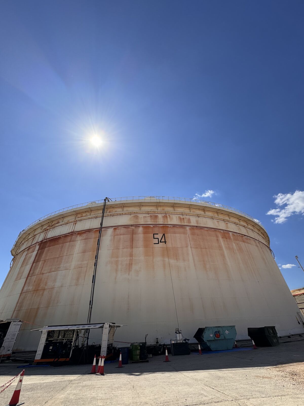 Floating-roof storage tank exterior at end of day