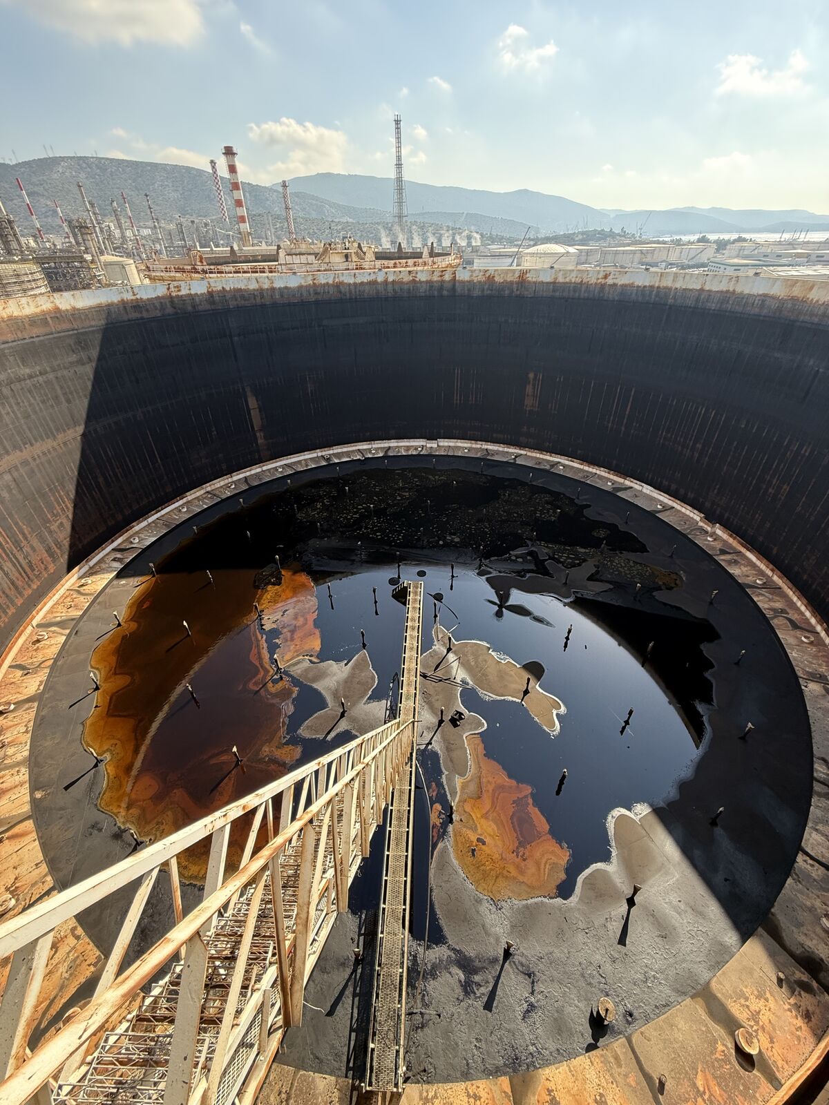 Aerial view down into a tank during cleaning operations