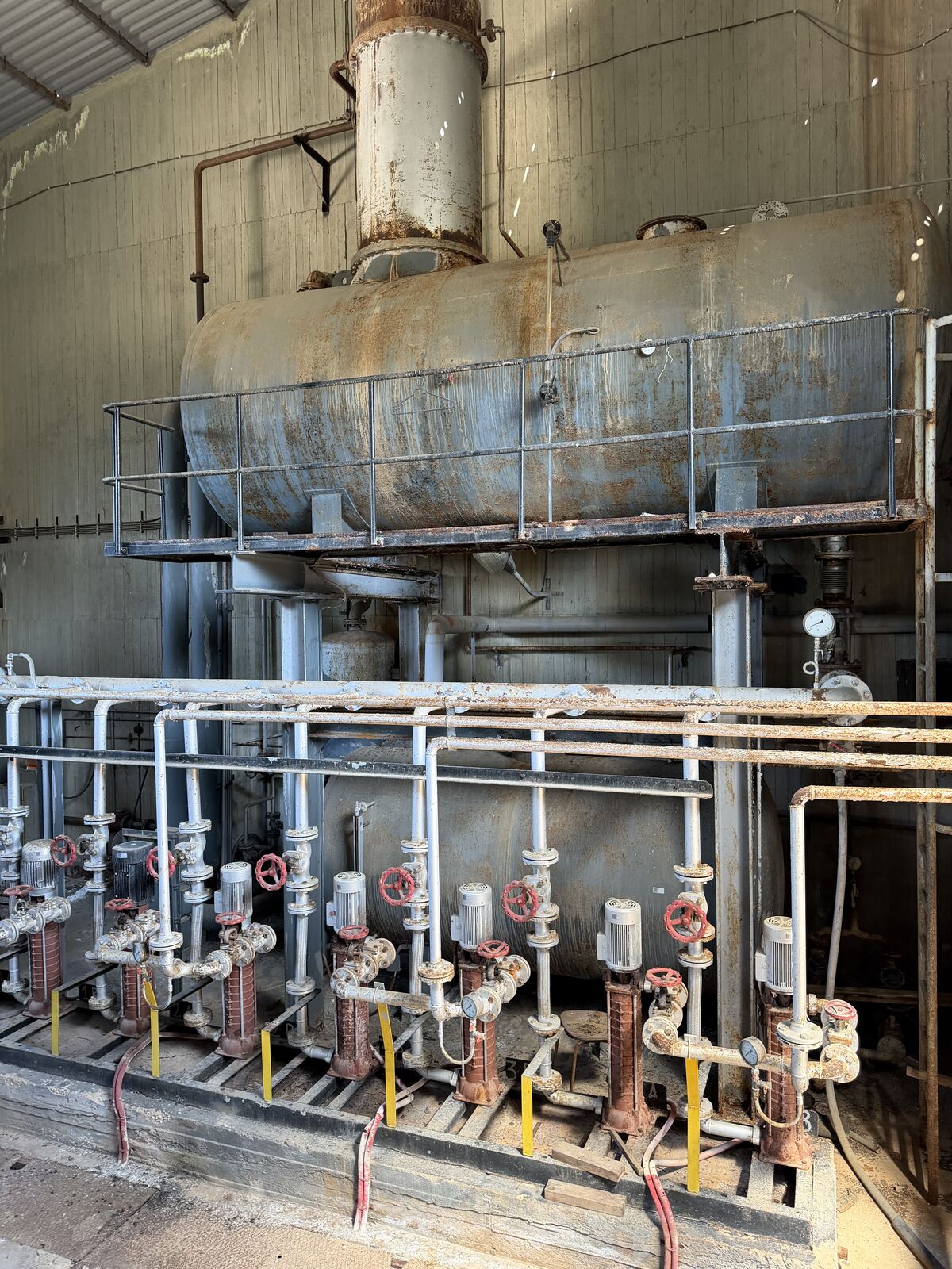Industrial process equipment and piping in a refinery section